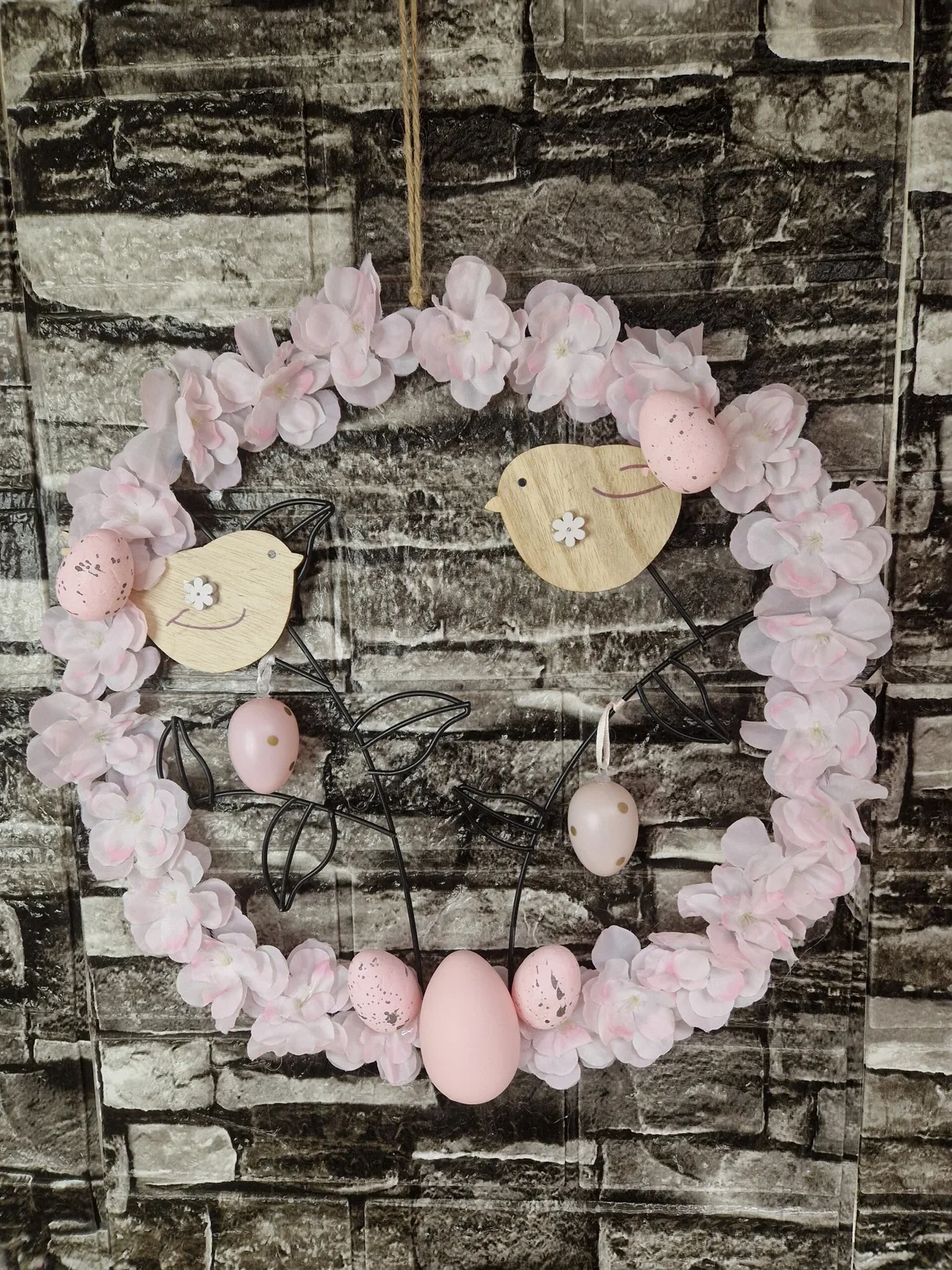 Türkranz mit Vögeln und rosa Blüten